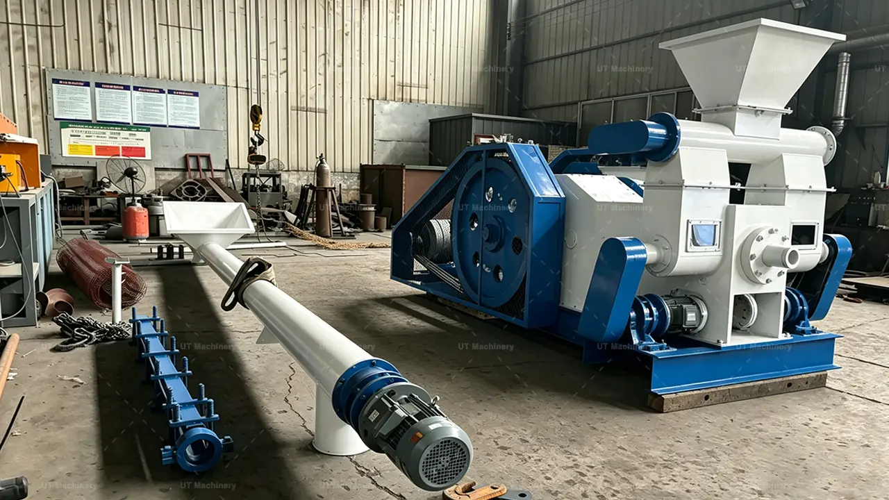 Heavy-duty mechanical stamping briquette machine with an integrated screw feeder conveyor in a factory workshop.