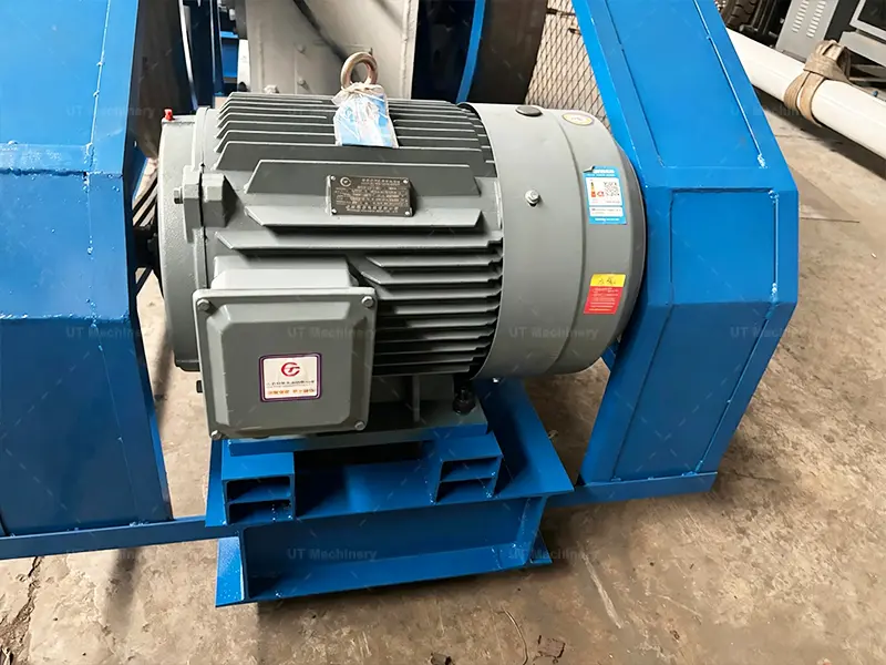 Close-up of a heavy-duty 55kW-75kW main driving motor optimized for 24/7 continuous biomass briquette production.