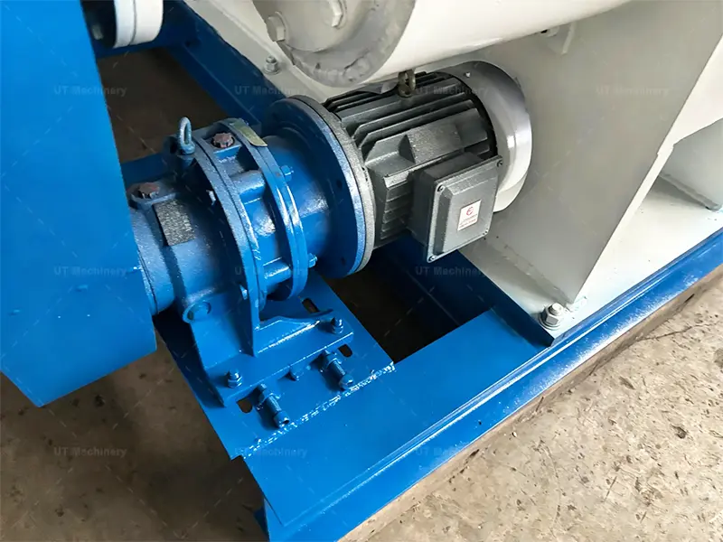High-torque industrial electric motor and gearbox assembly for a 1.5 TPH mechanical stamping briquette machine.