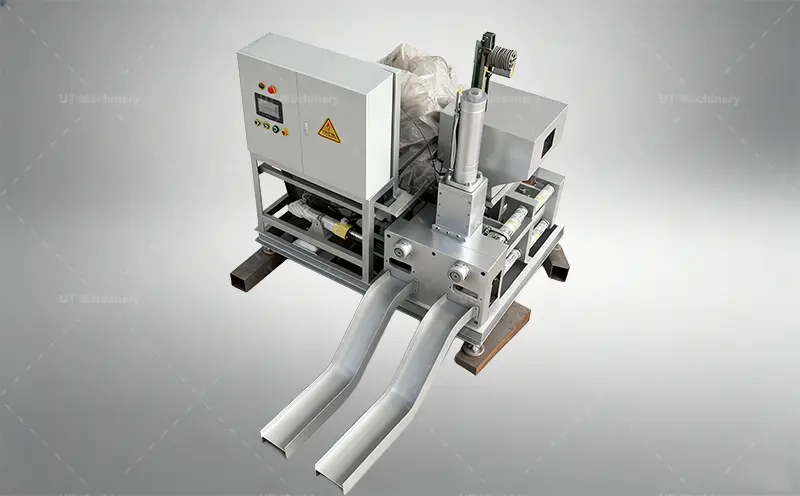 Side profile of the heavy-duty hydraulic copper swarf compactor showing the integrated fluid collection area.