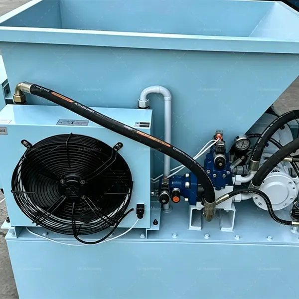 Detailed view of the forced-air hydraulic oil cooling system for continuous biomass briquette production.