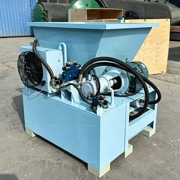 Rear technical view of UT Machinery hydraulic biomass briquette press showing the main motor and hydraulic pump.