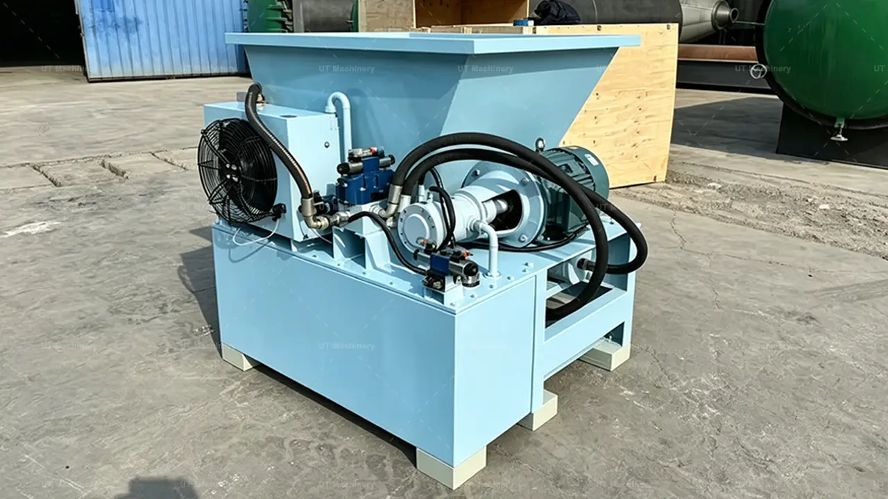 Technical view of the hydraulic piston system and motor for the UT Machinery briquetting press.