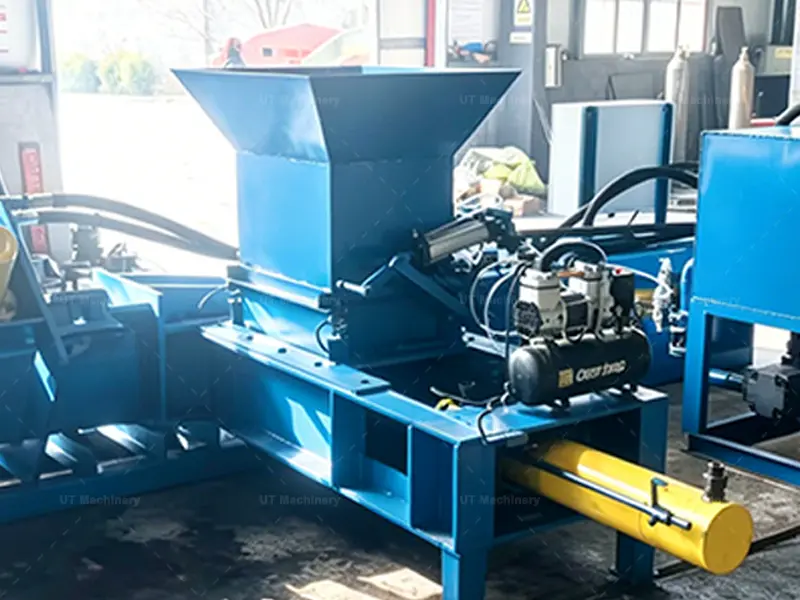 Automated dosing chamber and feeding hopper of coco peat briquette machine