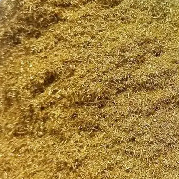 Loose fine brass sawdust and metal powder raw material before hydraulic briquetting process.