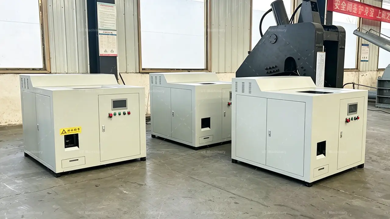 A row of heavy-duty hydraulic metal briquetting presses undergo final under-load testing on the UT Machinery factory workshop floor.